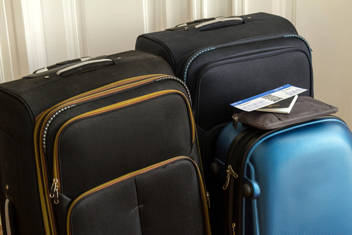 bags packed holiday travel insurance