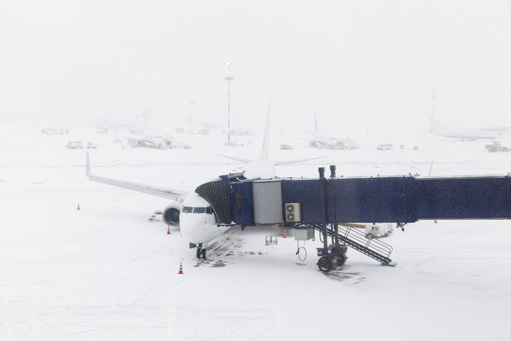 plane on snow covered runway